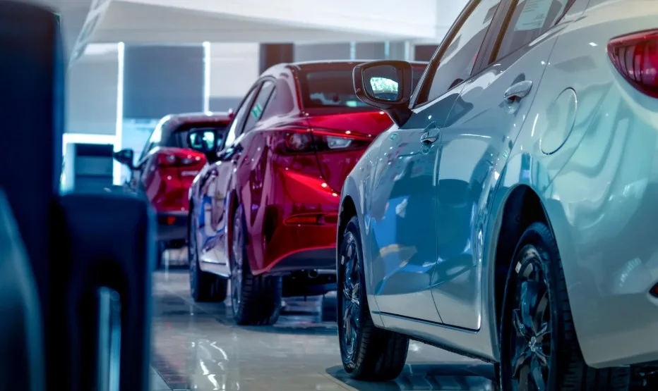 New cars on display at a dealership, representing vehicles that might be subject to Lemon Law claims, 247lemonlaw