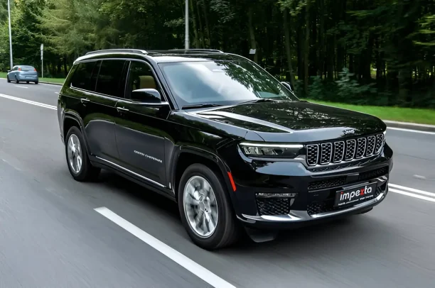 Black SUV driving on highway, potential lemon law vehicle