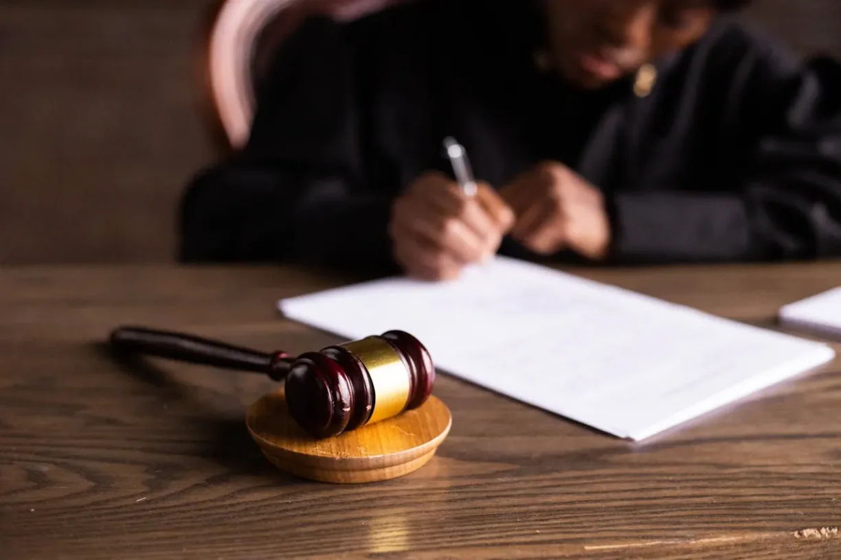 Legal paperwork and gavel symbolizing Lemon Law claims and justice.