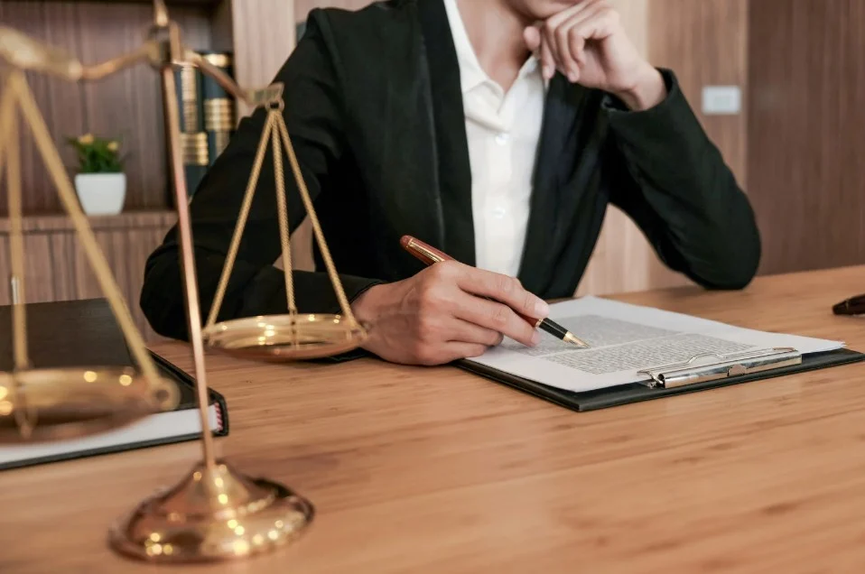 Lemon Law attorney reviewing a legal claim related to a defective vehicle