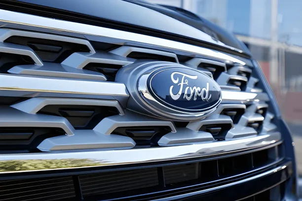 Close-up of Ford logo on vehicle front grille