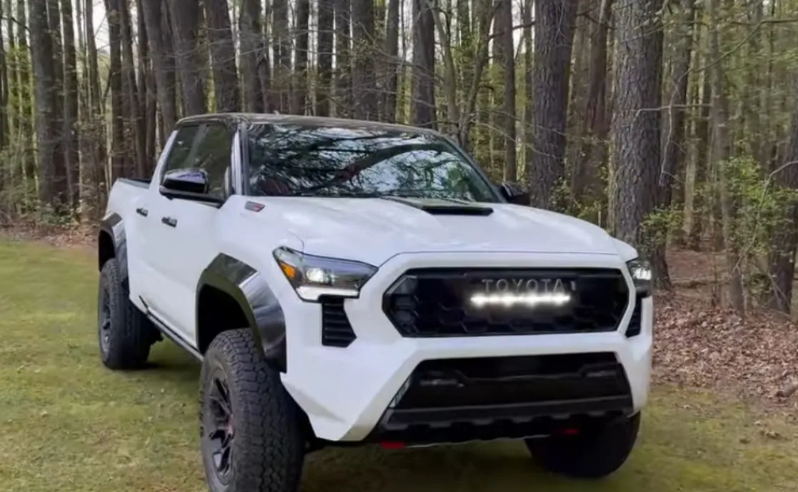 2025 Toyota Tacoma TRD Pro front view highlighting 2025 Tacoma problems reported by owners including transmission and engine issues